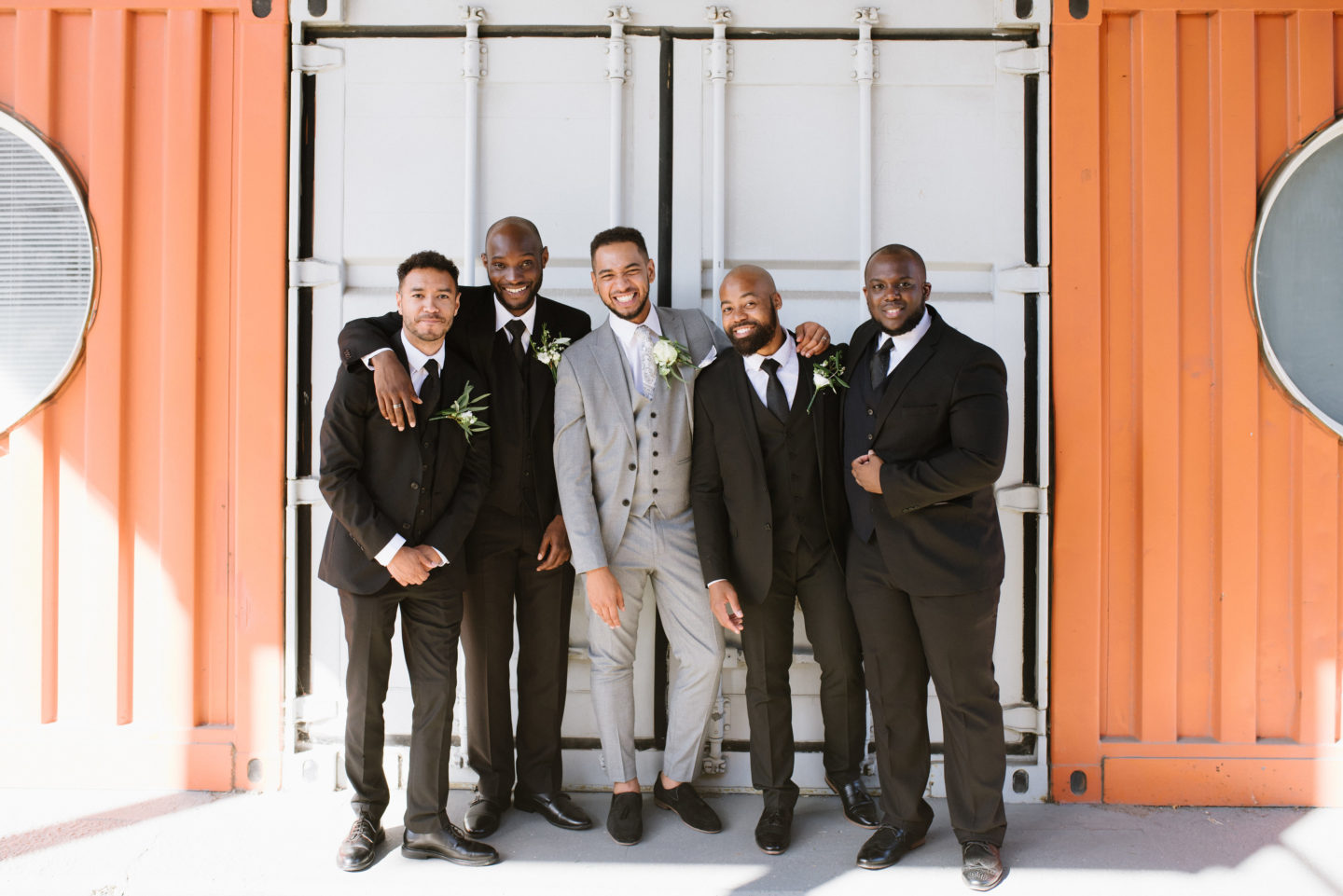Modern Wedding Party | Black Groomsmen suits | Grey Groom Suit